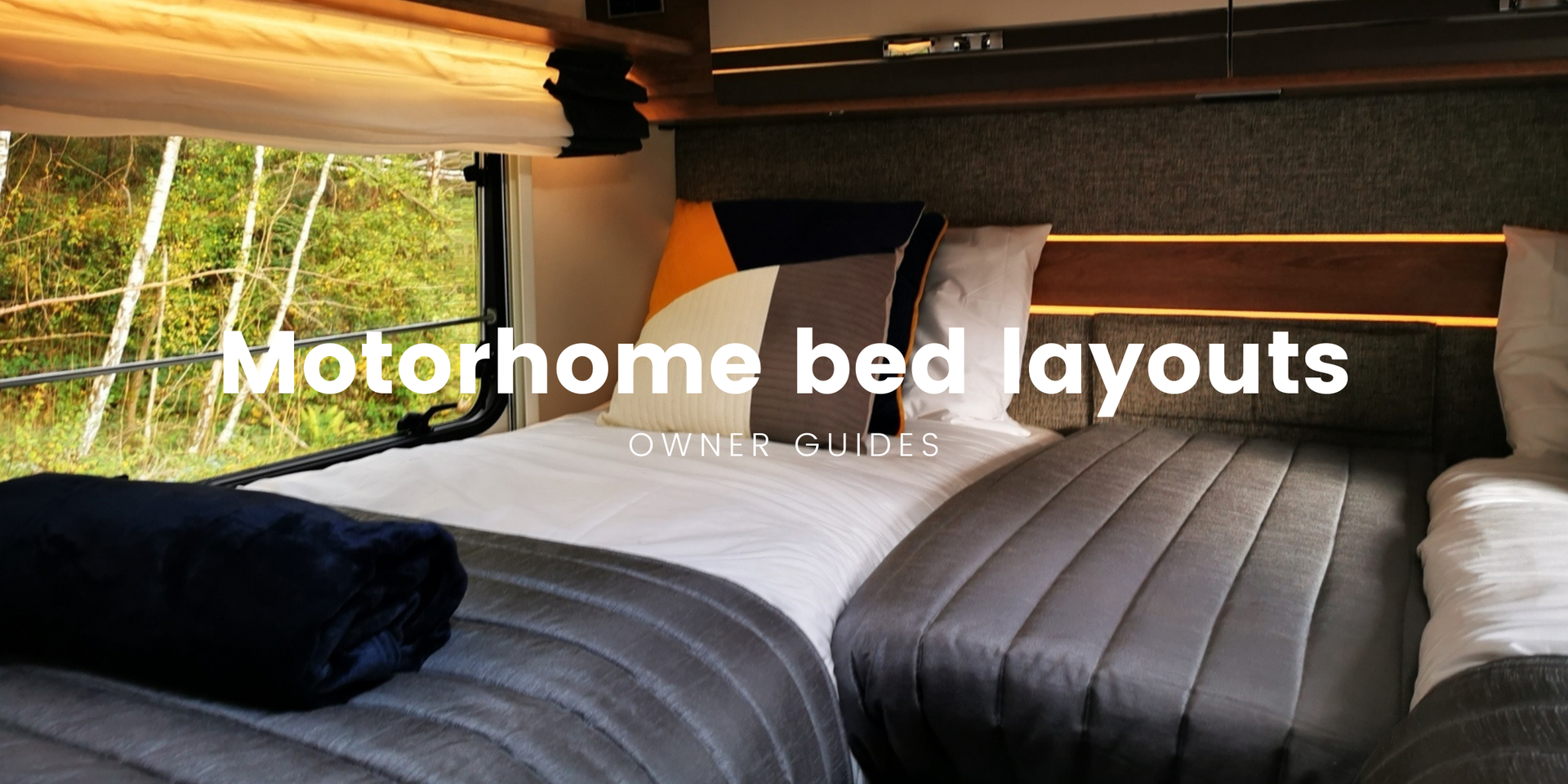 Campervan parked up at a scenic campsite, ready for a motorhome holiday adventure.