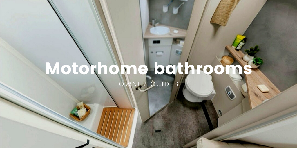 Motorhome parked by a loch, showcasing the freedom of campervan travel.