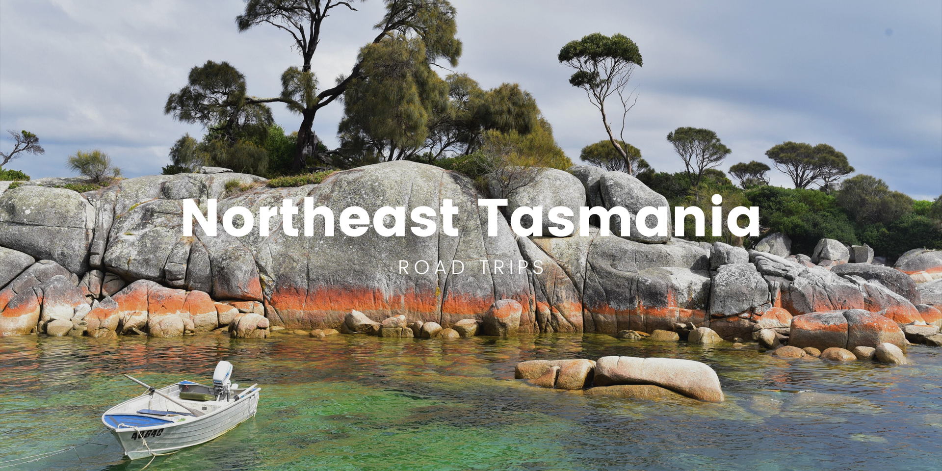 Caravan overlooking a misty valley in North East Tasmania, ready for a road trip adventure.