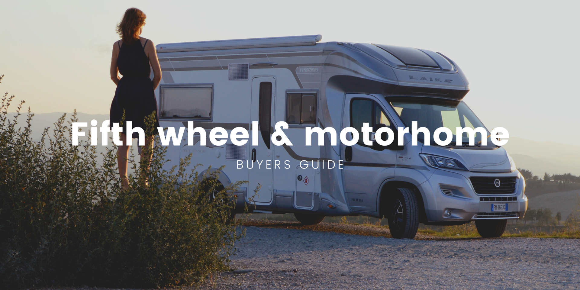 Fifth-wheeler and motorhome parked up at a scenic South Island campsite, ready for adventure.