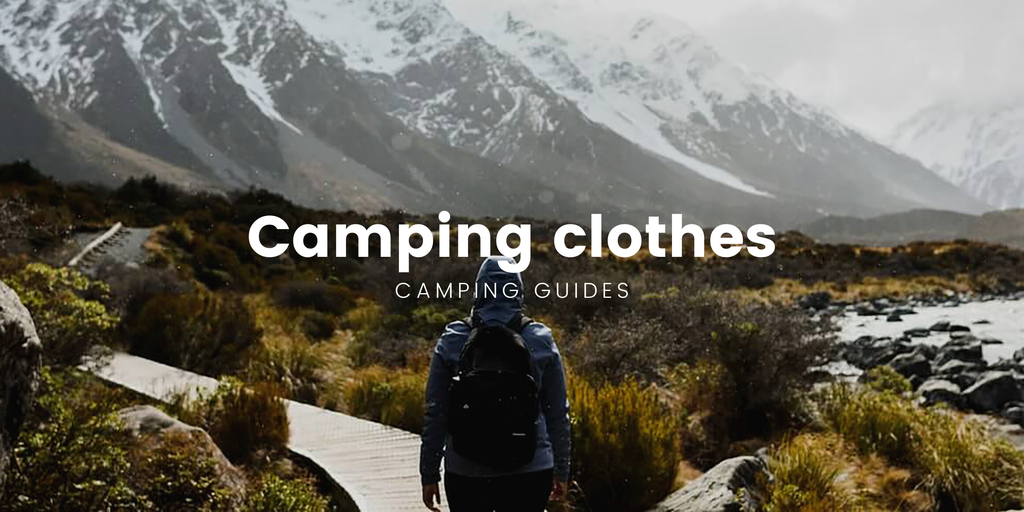 Winter campsite in the Southern Alps, with snow-capped mountains and a tent pitched in the foreground.