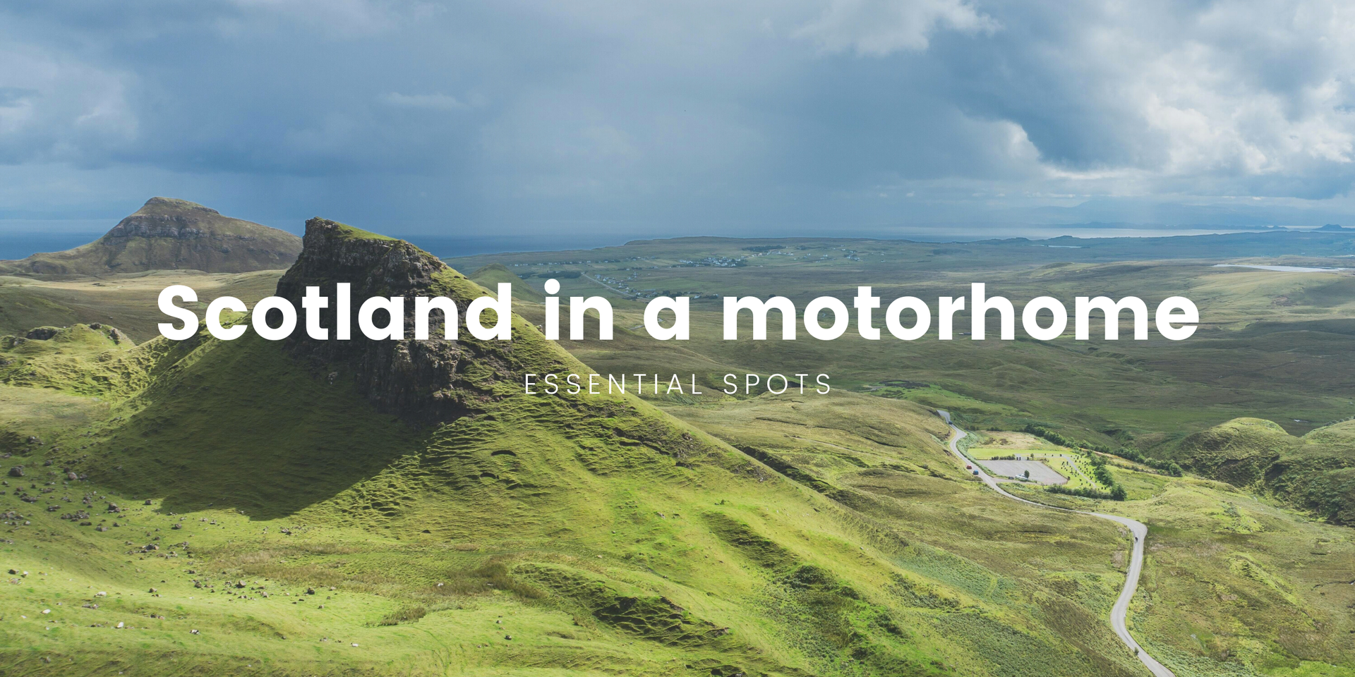 Motorhome parked with stunning Scottish Highlands scenery in background.