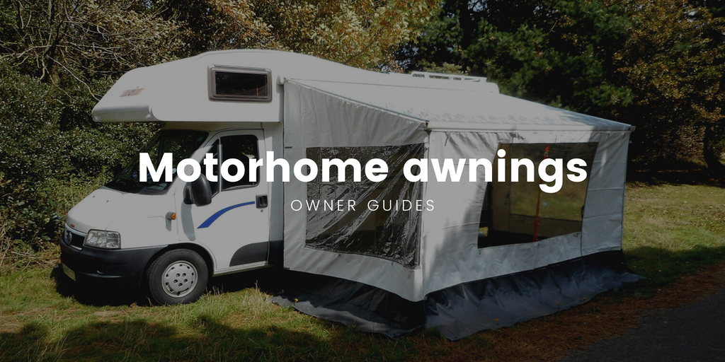 Motorhome with awning parked on a sunny campsite, ready for a camping holiday.