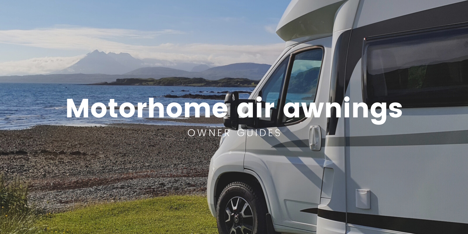 Motorhome with inflated awning pitched at sunny campsite, family enjoying the outdoors.