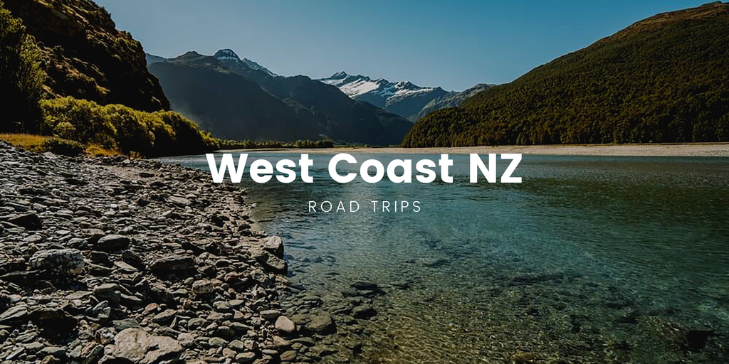 West Coast road trip: Campervan overlooking Franz Josef Glacier on a sunny day.