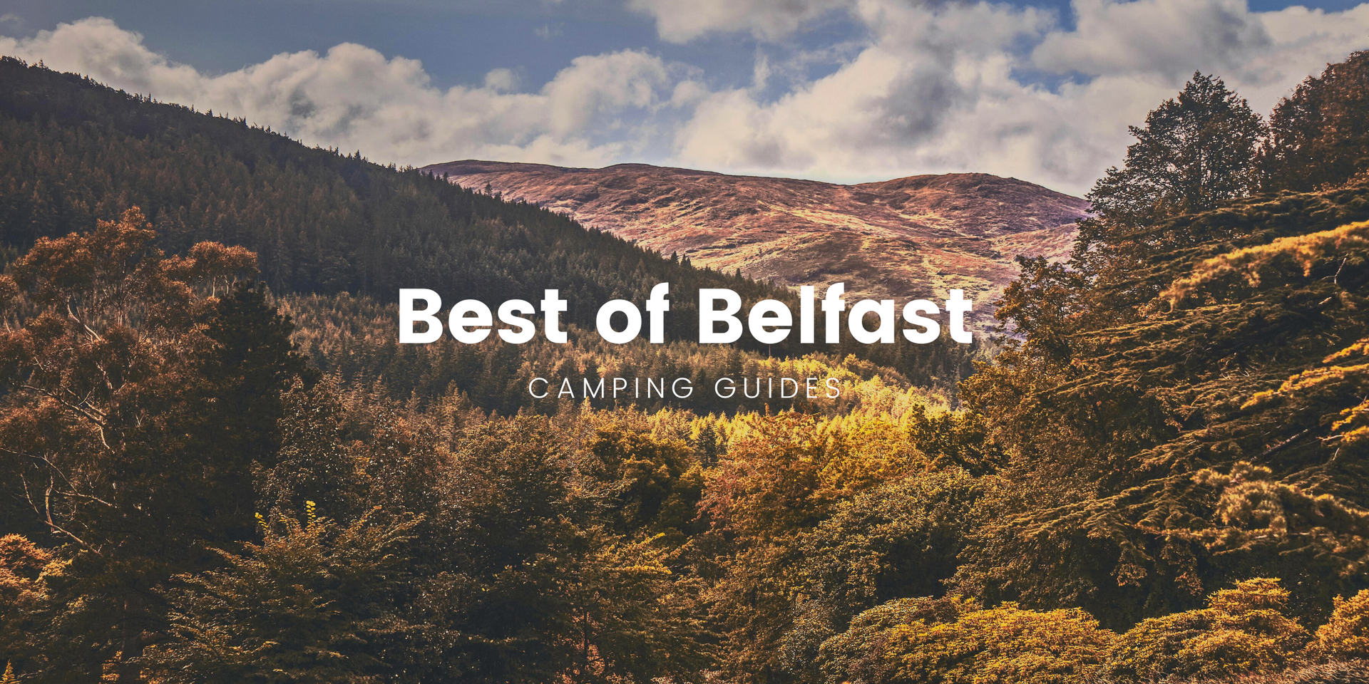 Tents pitched at Belfast campsite, Northern Ireland, under a moody sky.