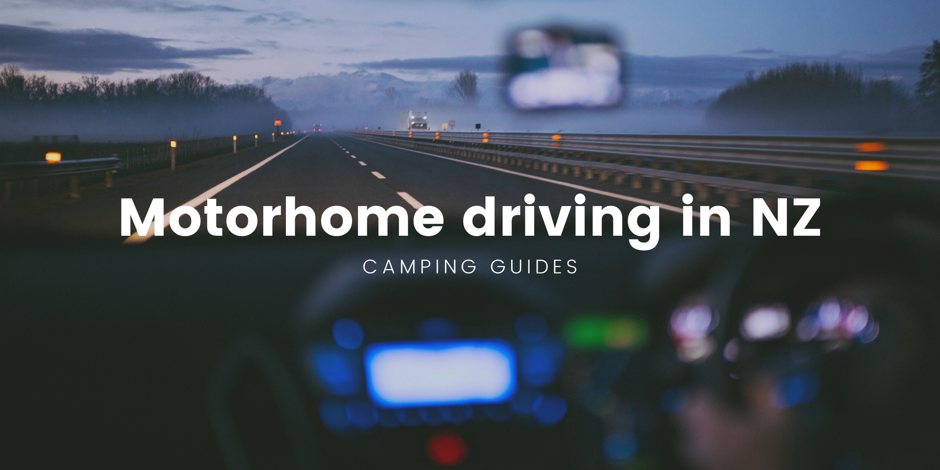 Motorhome parked at a scenic NZ campsite, ready for a road trip adventure.