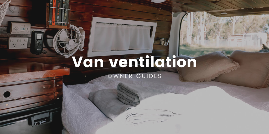 Campervan with roof vent parked at a beaut bush campsite.