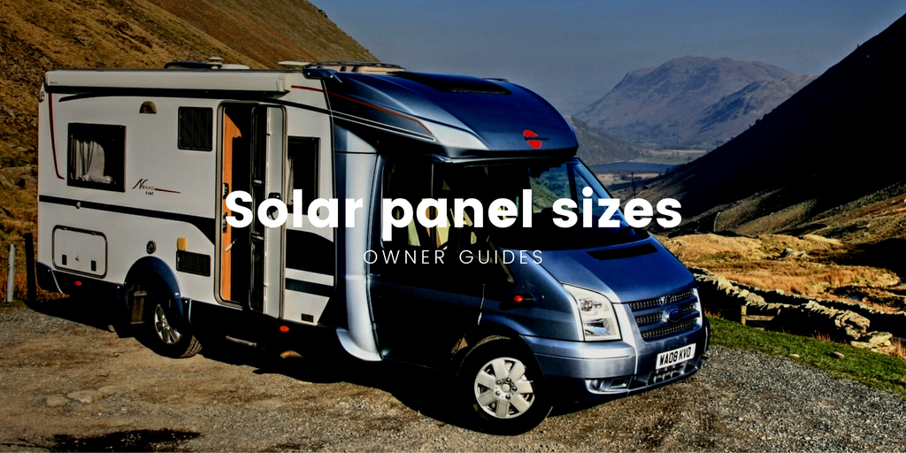 Campervan parked up in a sunny field, ready for a road trip adventure.