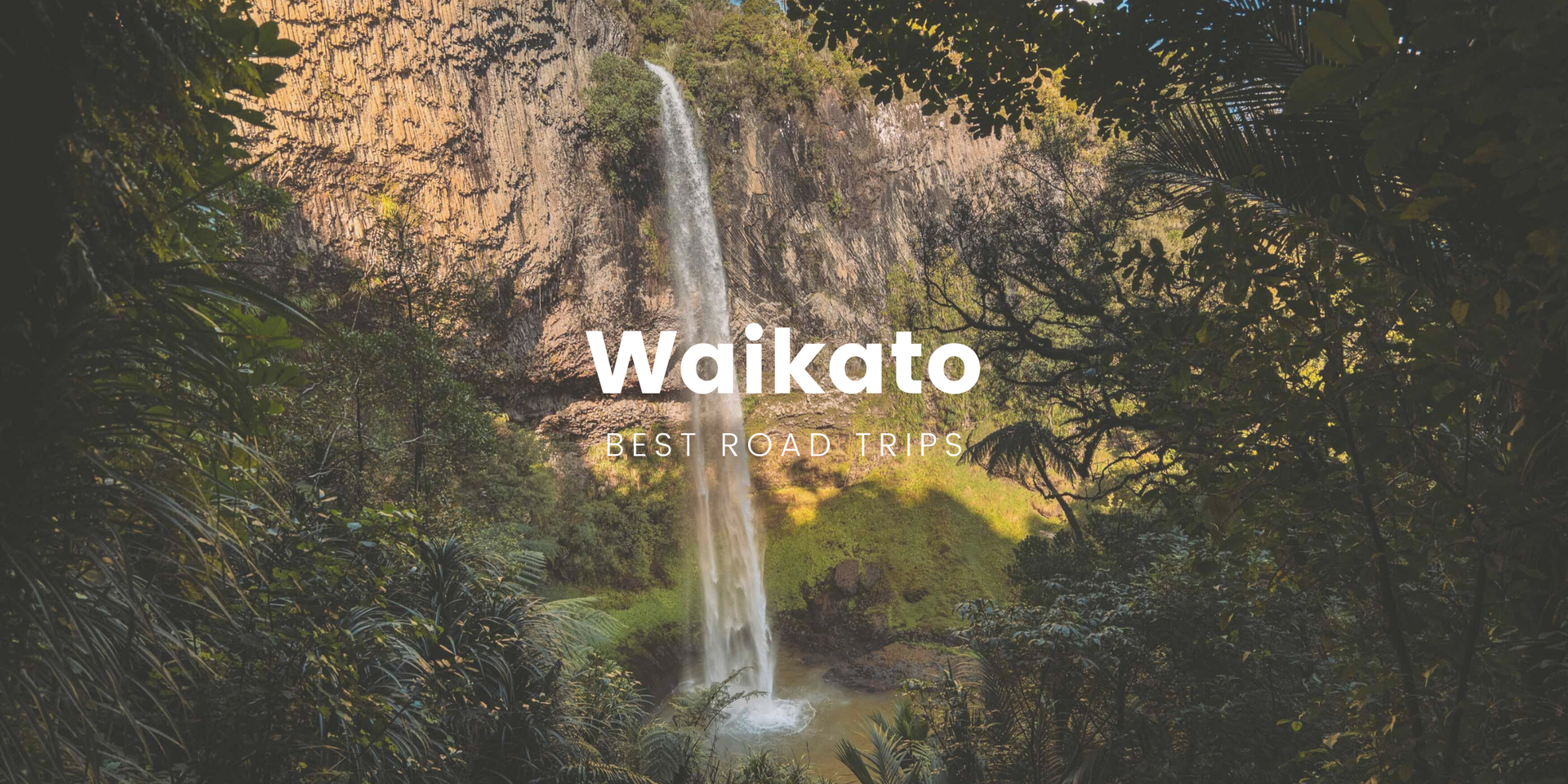 Caravan parked up by a scenic Waikato river, ready for a Kiwi roadie.