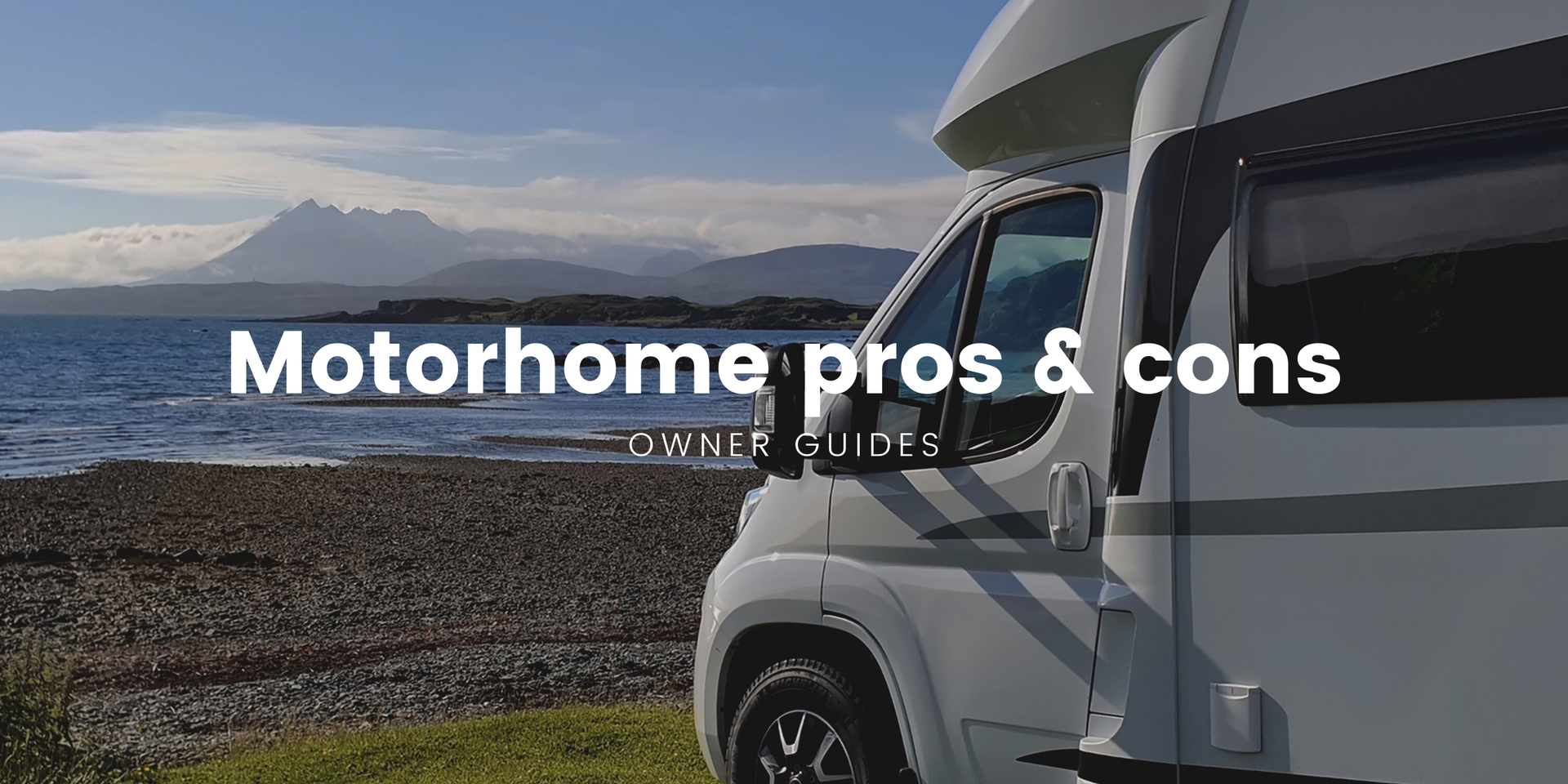 Motorhome parked up at a scenic lakeside campsite, ready for a relaxing outdoor holiday.