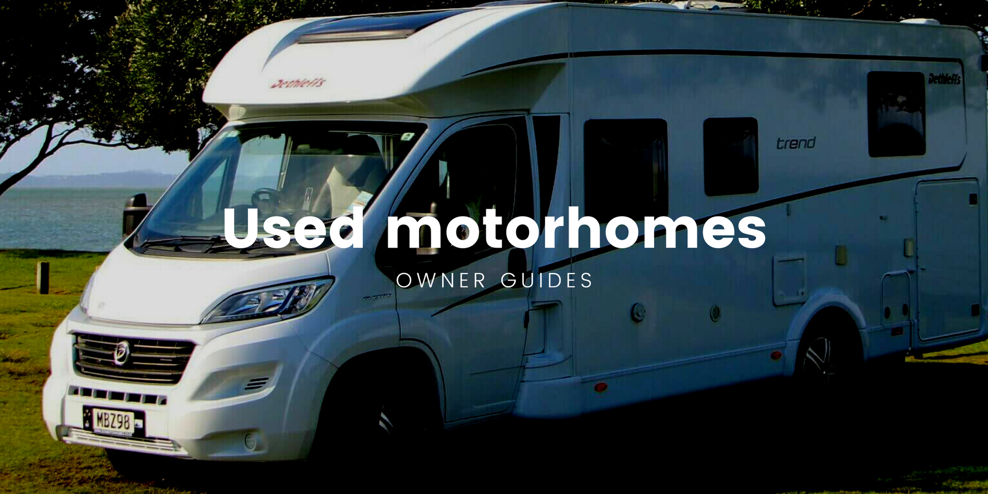 Motorhome parked up in a scenic Kiwi camping spot, ready for adventure.