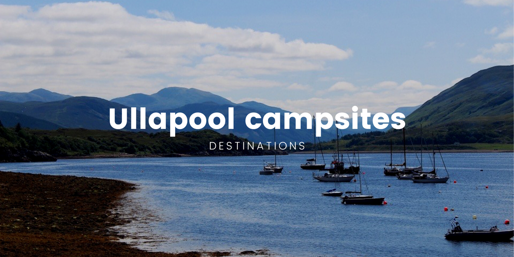 Campervan parked overlooking a loch in the Scottish Highlands. Part of the NC500 touring route.