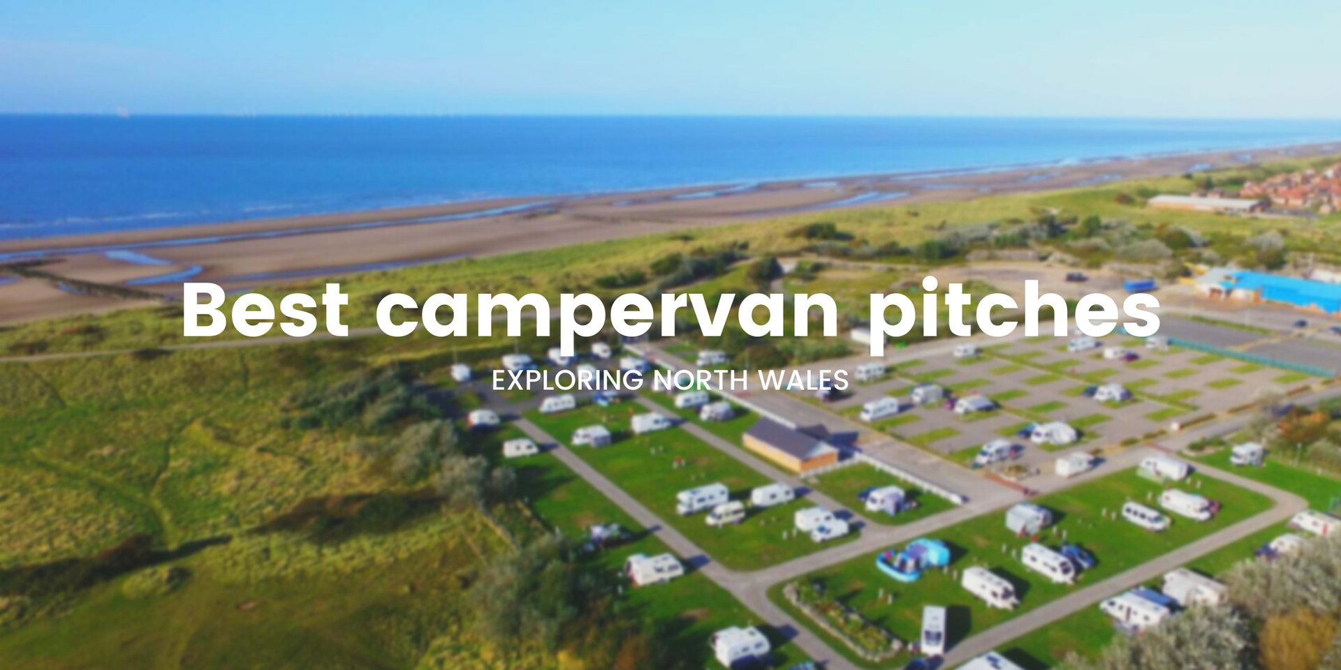 Campervan overlooking mountains in Snowdonia National Park, North Wales.