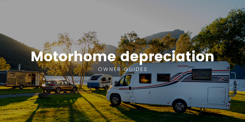 Motorhome parked on clifftop overlooking a picturesque coastal view.