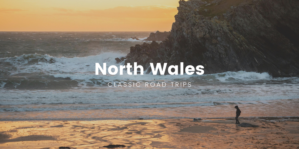 Campervan overlooking Snowdonia's mountains. North Wales road trip adventure awaits!