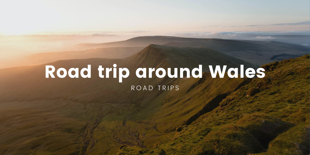 Caravan overlooks scenic Welsh coastline. South Wales road trip holiday.