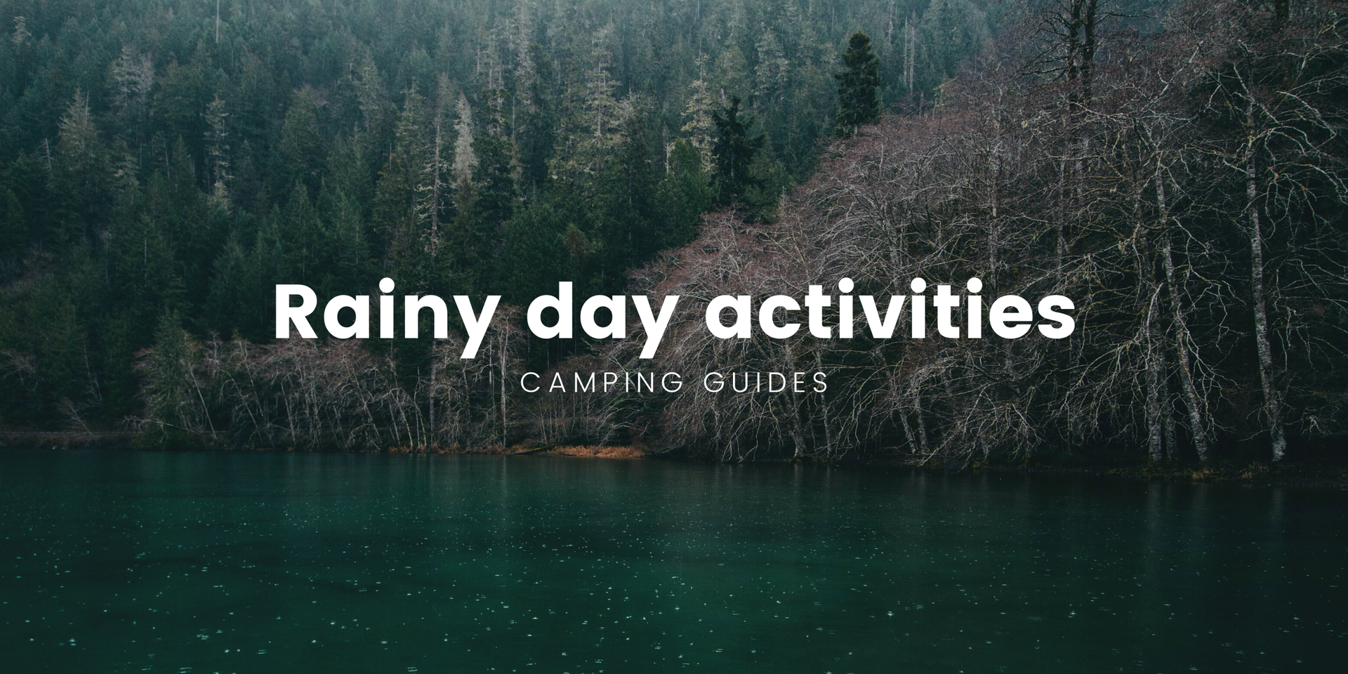 Family playing cards in tent on a rainy camping trip in the bush.