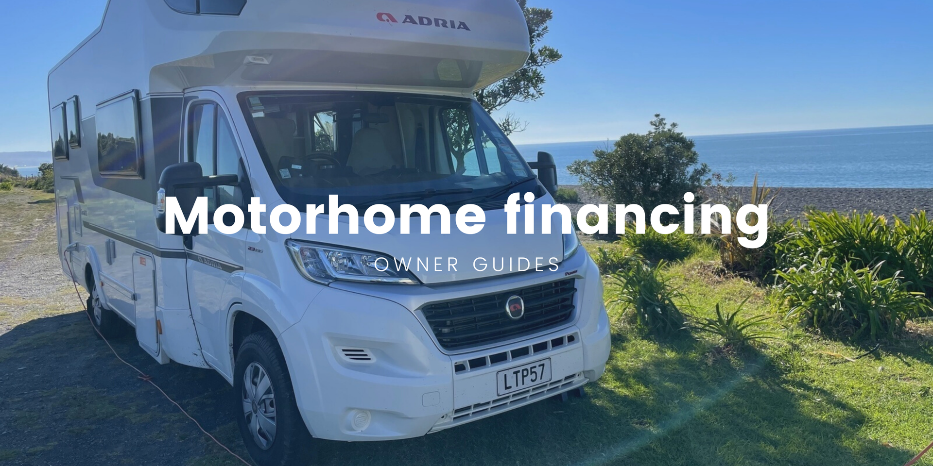 Motorhome parked up at a scenic Kiwi campsite, ready for a roadie.