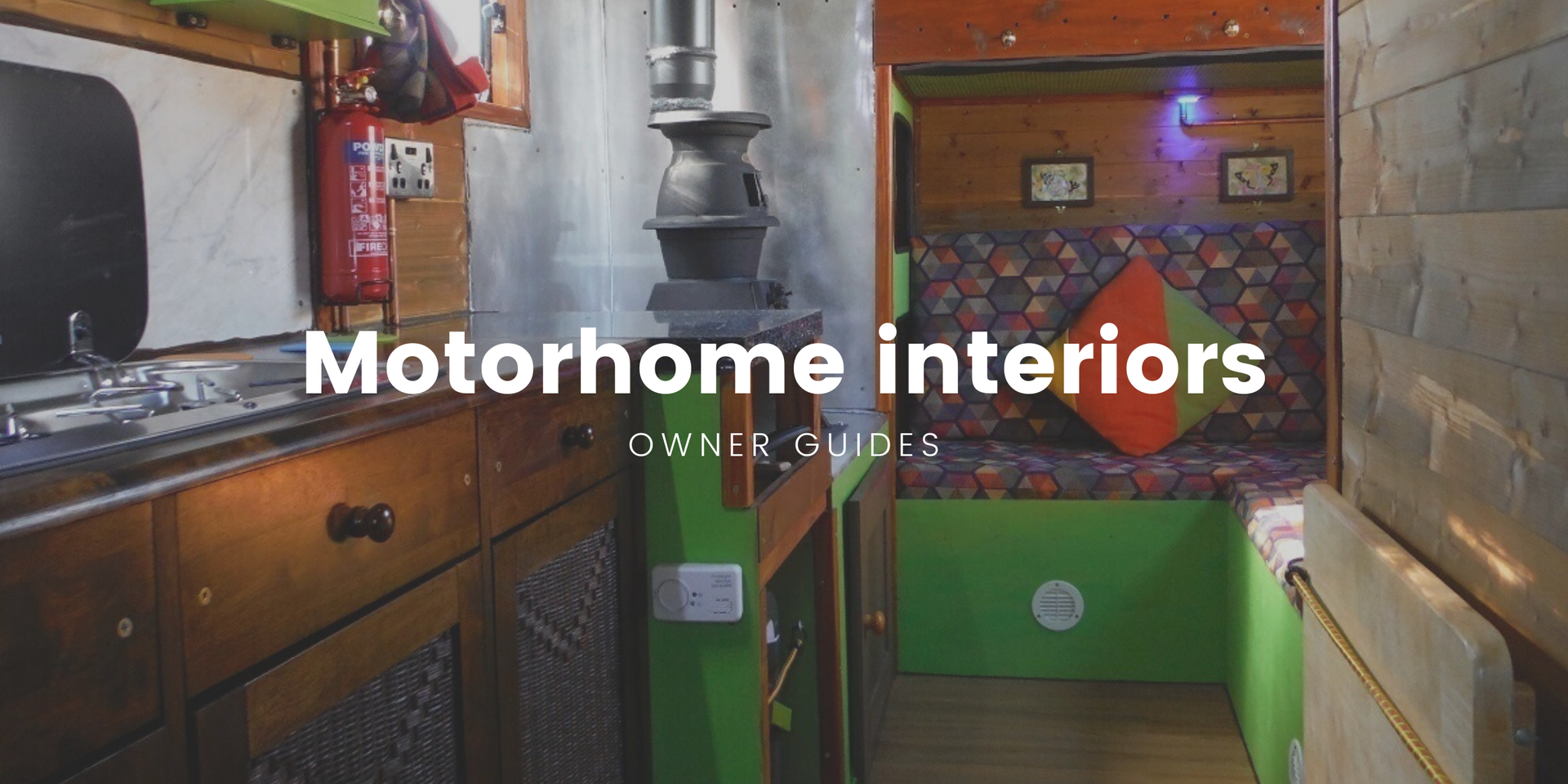 Cosy motorhome interior, fairy lights twinkling. Perfect for a camping holiday.