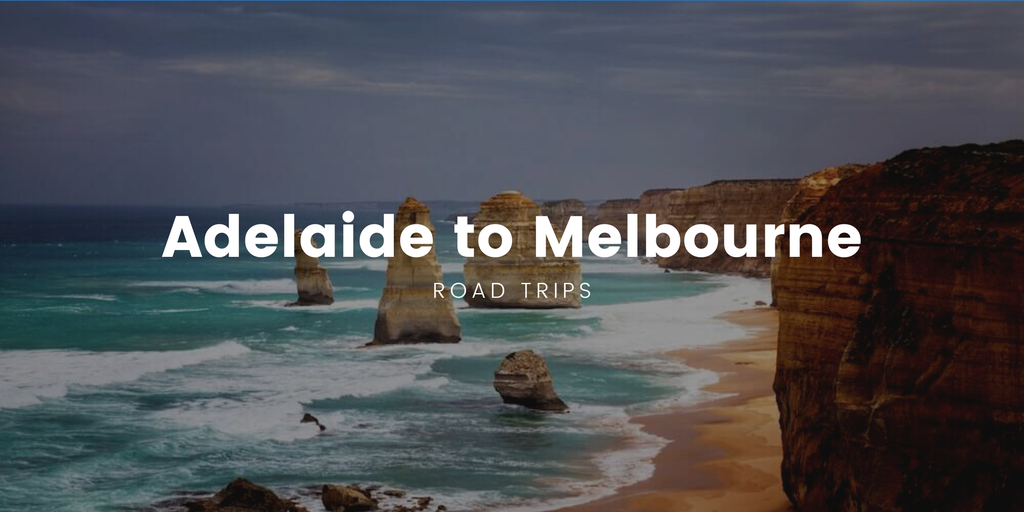 Coastal road trip: Campervan driving the Great Ocean Road with stunning ocean views.