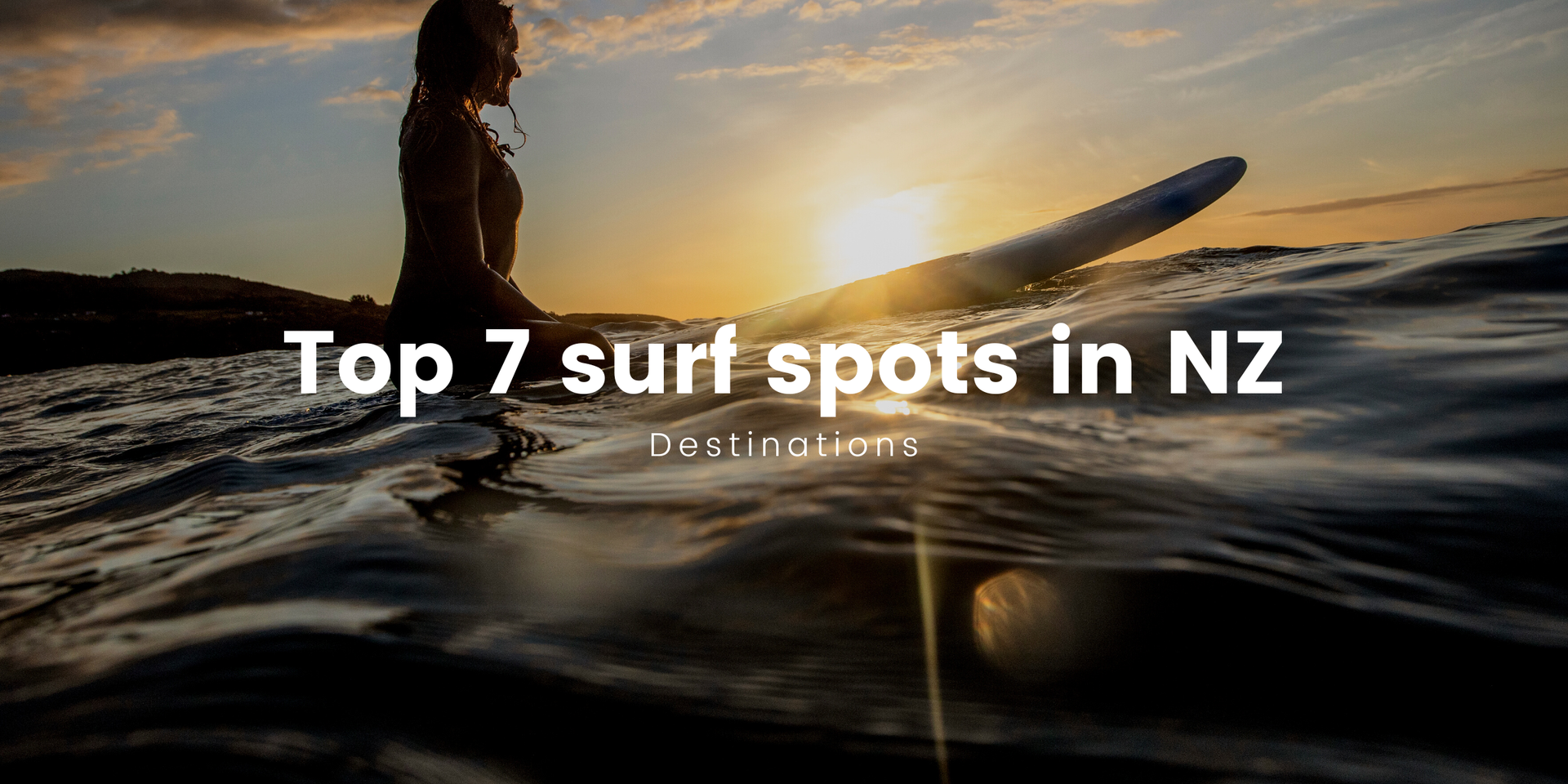 Surfer dude riding a gnarly wave at a Kiwi surf beach. Choice!