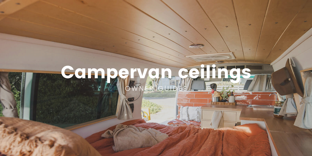 Campervan interior with wood panelled walls and ceiling, ready for a roadie.