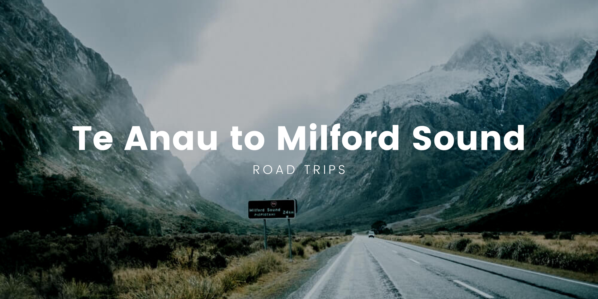 Scenic shot of campervan driving the Milford Road, Fiordland National Park.
