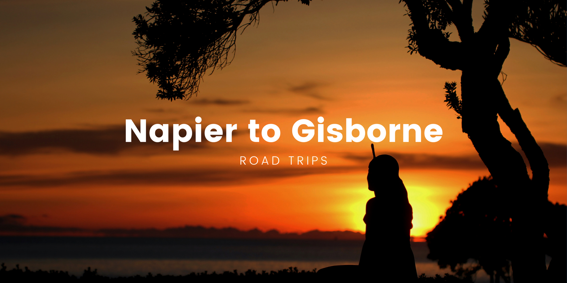 Coastal road trip in a campervan, heading from Napier to Gisborne. Sunshine and blue skies.