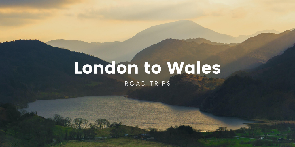 Campervan overlooking scenic Welsh mountains. Road trip adventure from London to Wales.