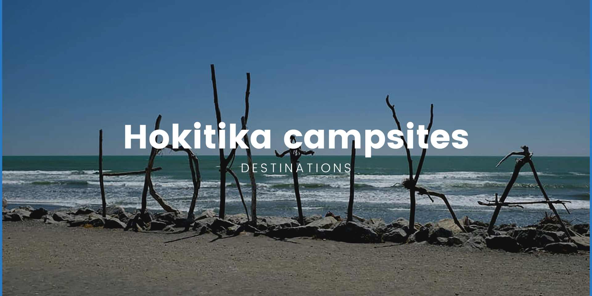 Tent pitched at a Hokitika campsite, with the Southern Alps in the background.
