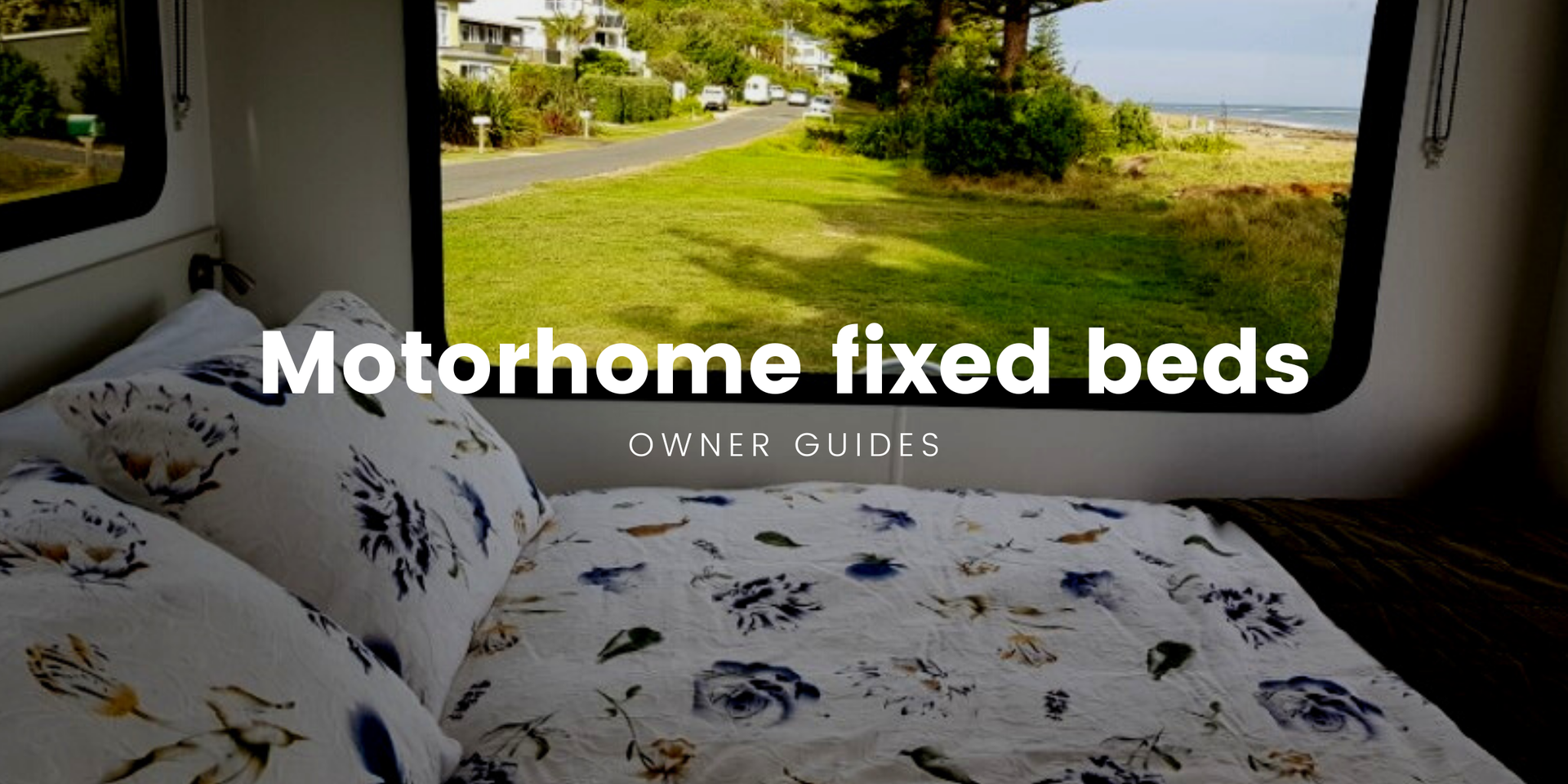 Motorhome parked up with stunning mountain backdrop, showcasing the freedom of campervan travel.