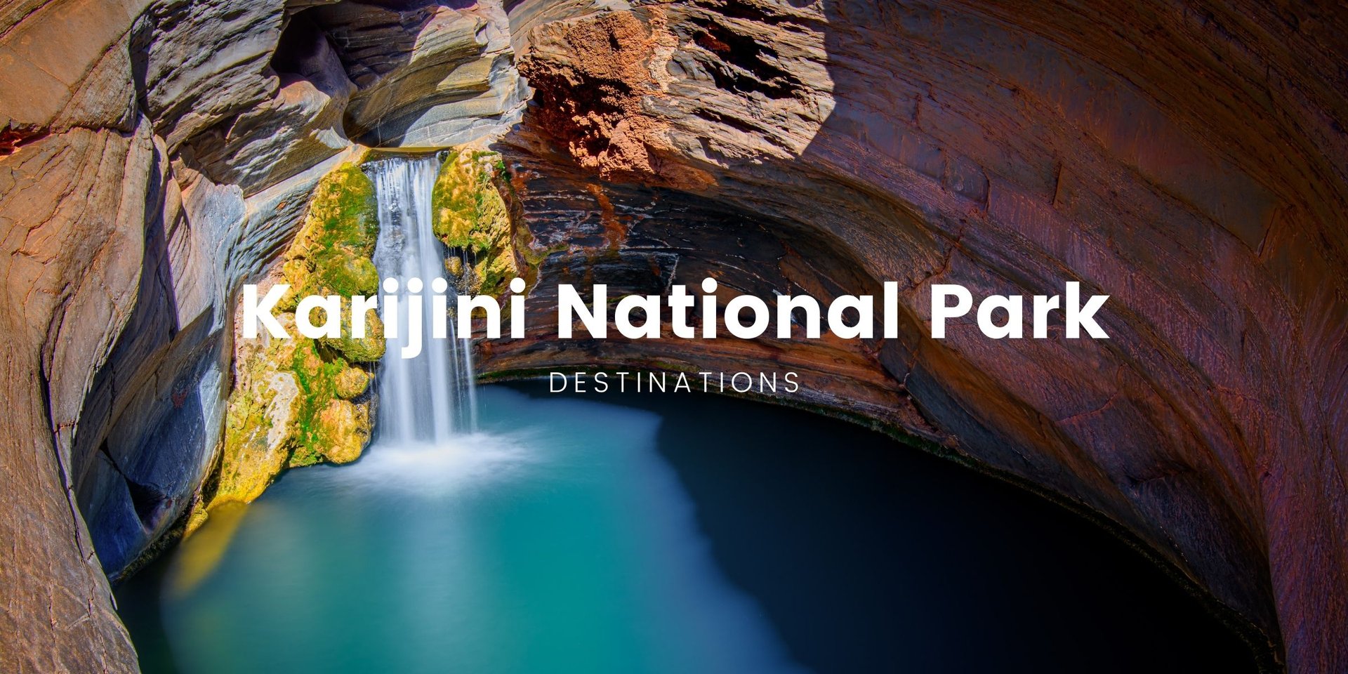 Campervan parked near a Karijini gorge, with red rock formations in the background.