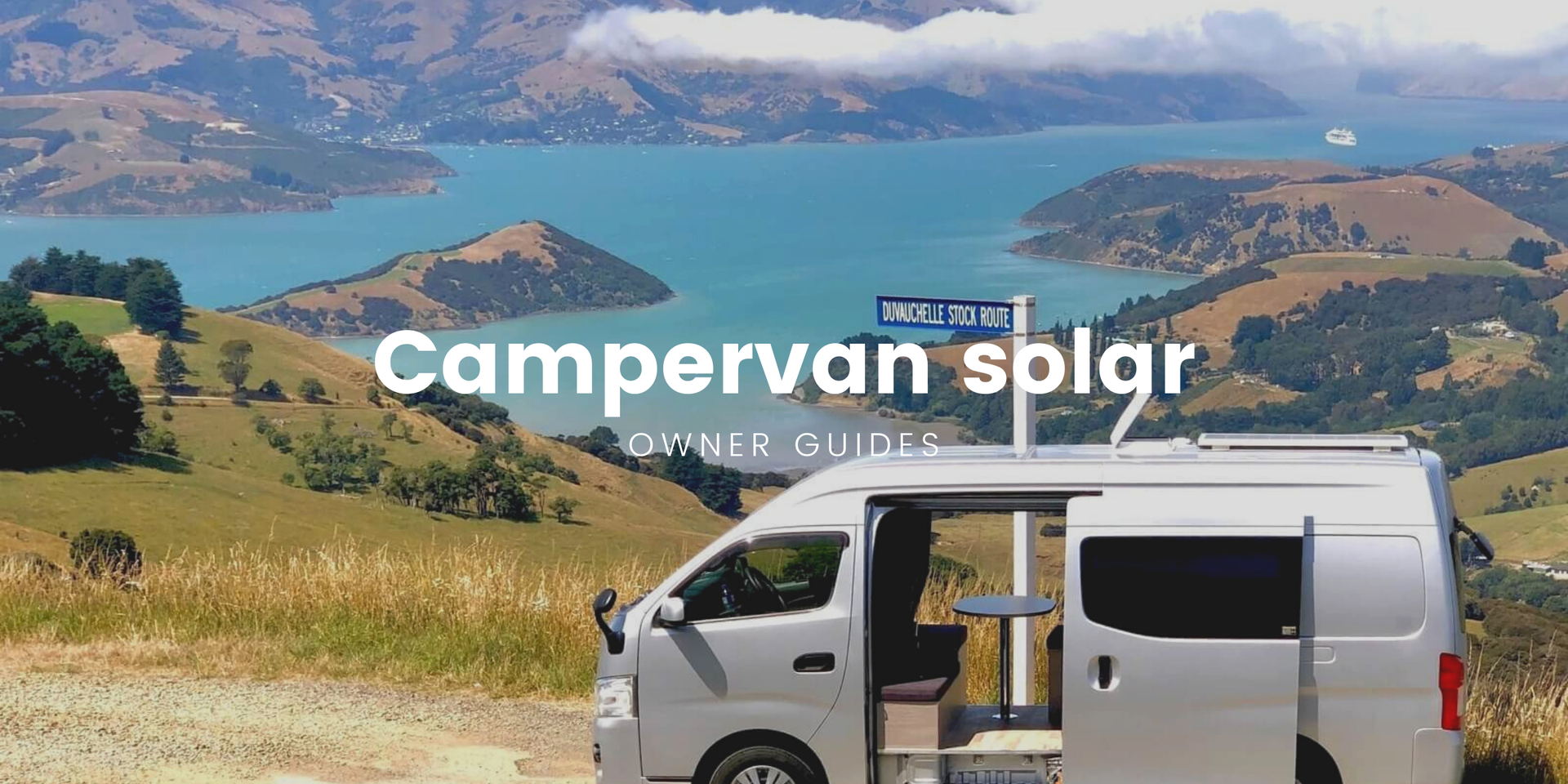 Campervan parked up with solar panels, stunning mountain backdrop. Freedom camping vibes!