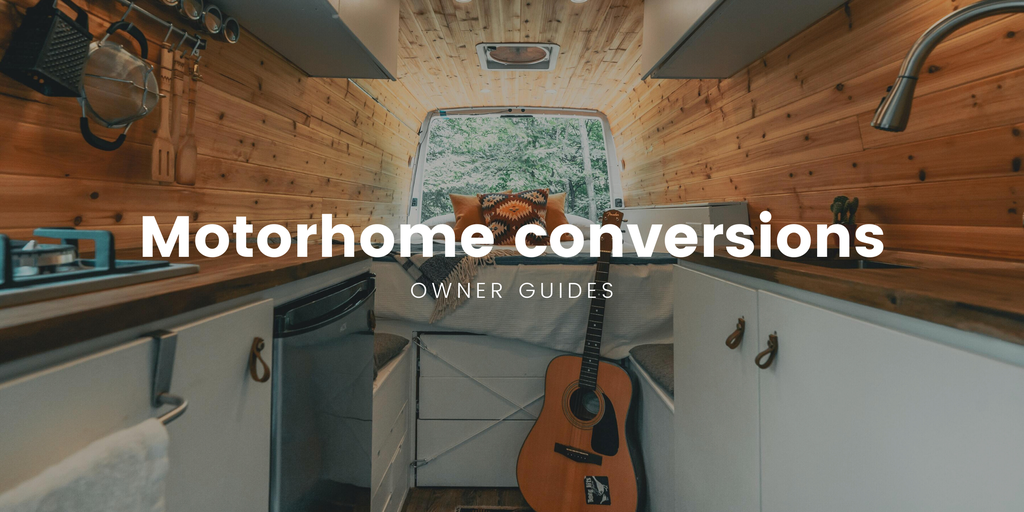 Campervan parked overlooking scenic mountain range, adventure travel and outdoor lifestyle.