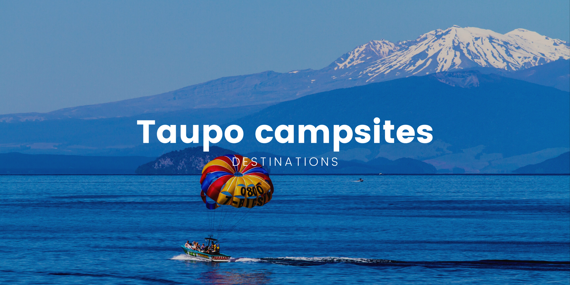 Tent pitched beside Lake Taupo at sunset, perfect for a summer camping trip.