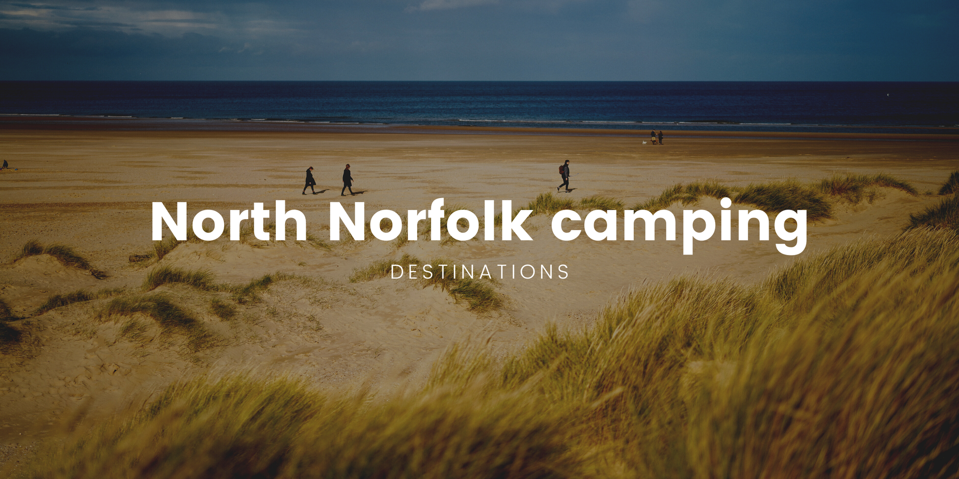 Campervan parked near the North Norfolk coast. Seaside camping for a road trip adventure.