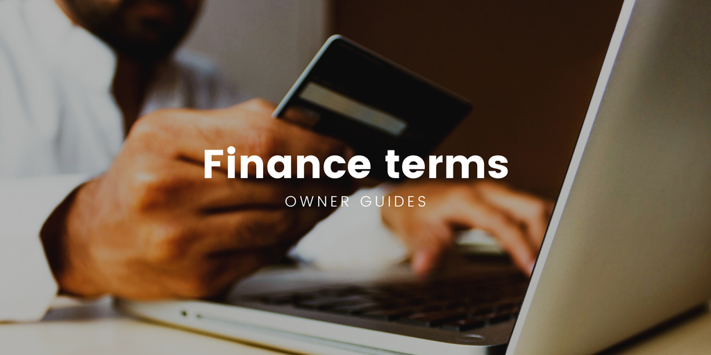 Motorhome parked up at a scenic campsite, representing holiday travel and financing options.