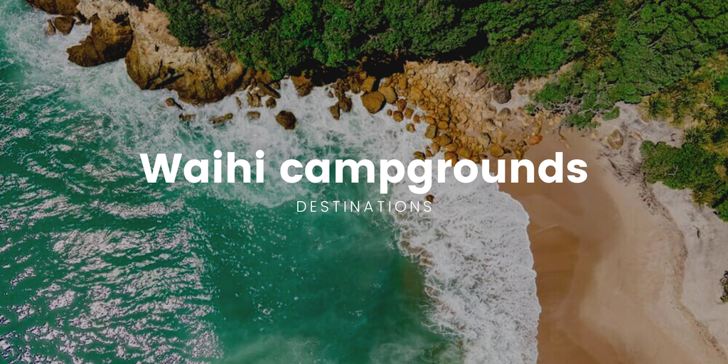 Tents and campervans at a Waihi Beach camping ground, perfect for a summer holiday.