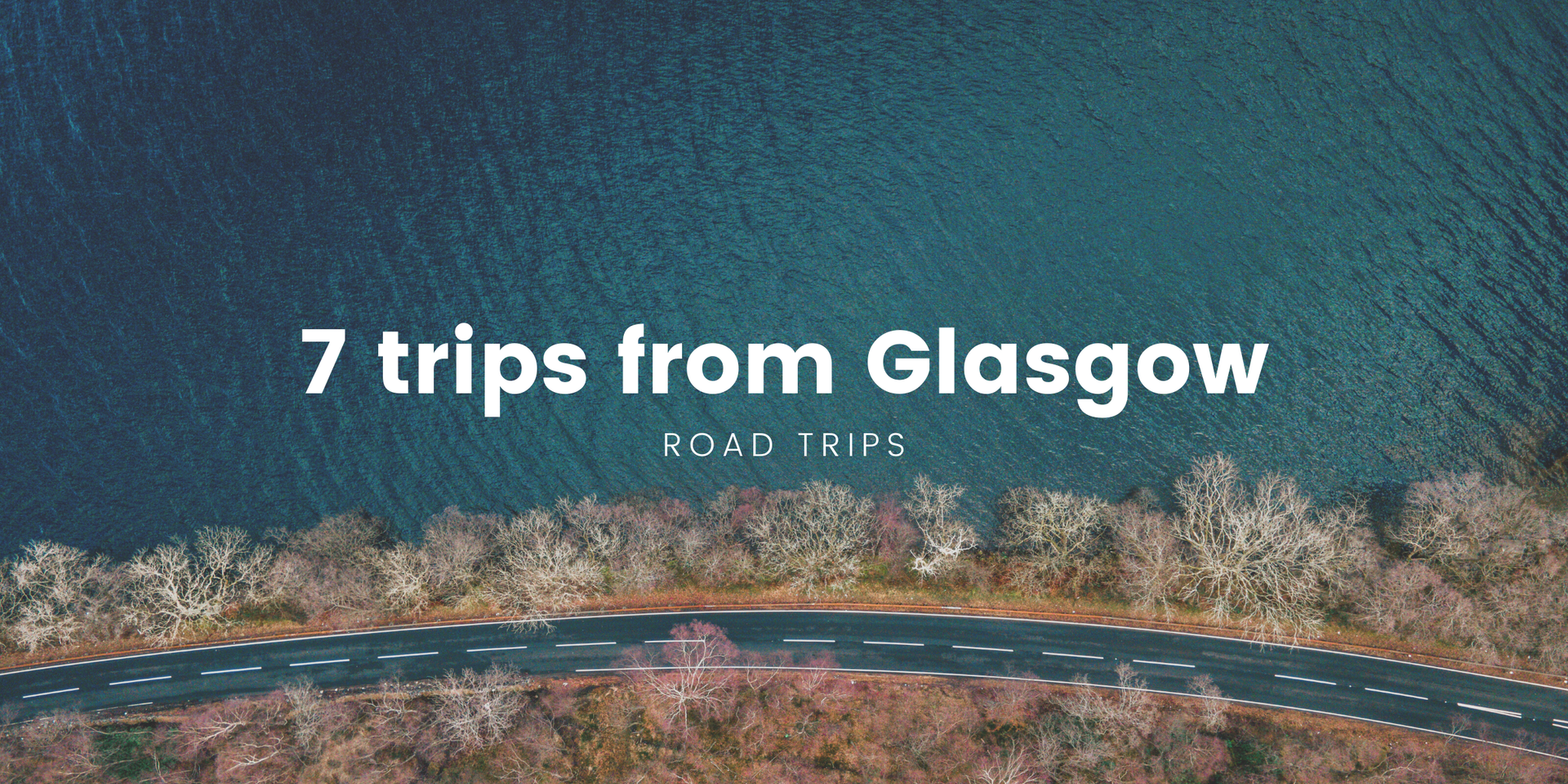 Campervan driving through scenic Scottish Highlands. Road trip near Glasgow.