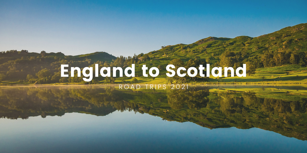 Campervan driving on scenic road through Scottish Highlands. Road trip holiday!