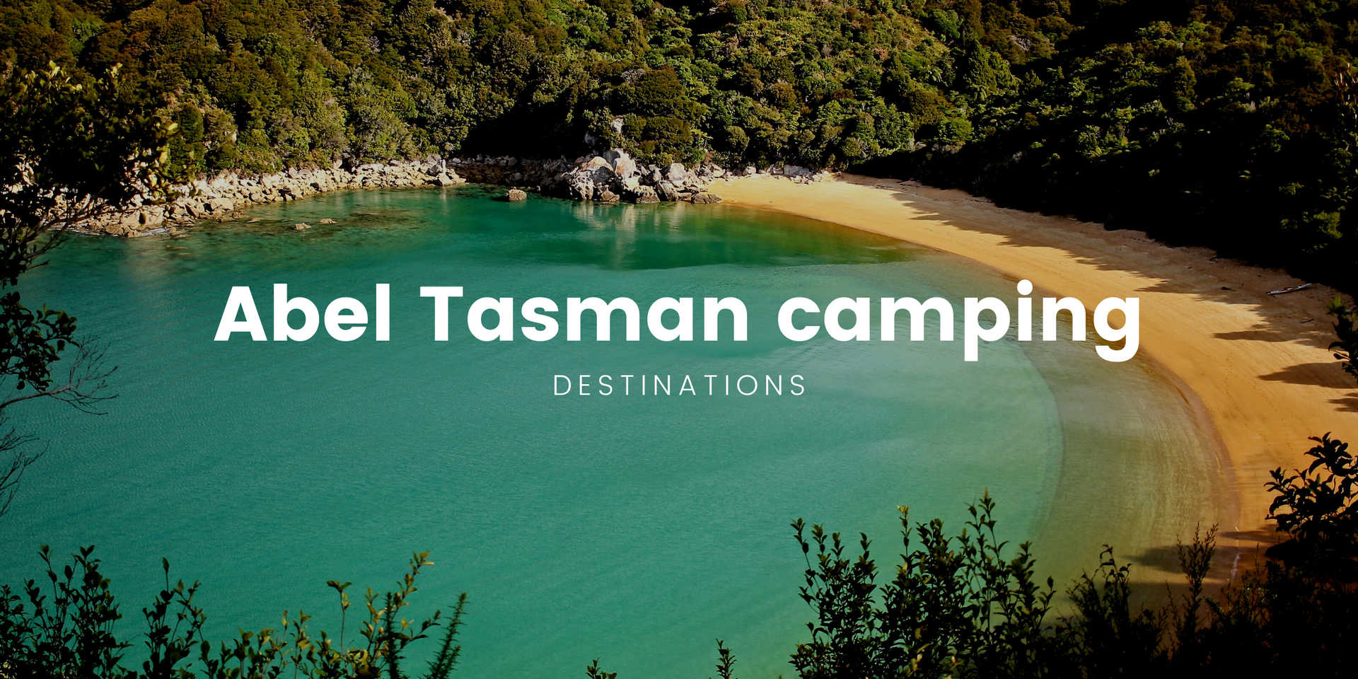 Tenting in a campground near Abel Tasman, with golden sand beaches in the distance.