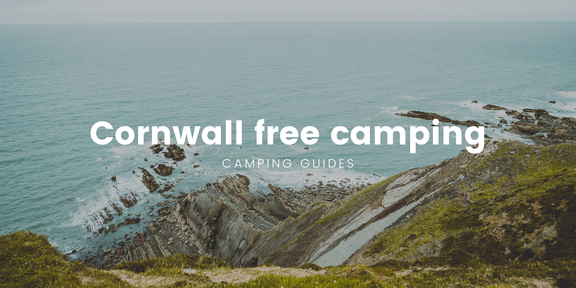 Tent pitched on Cornish clifftop, overlooking a stunning coastal view.