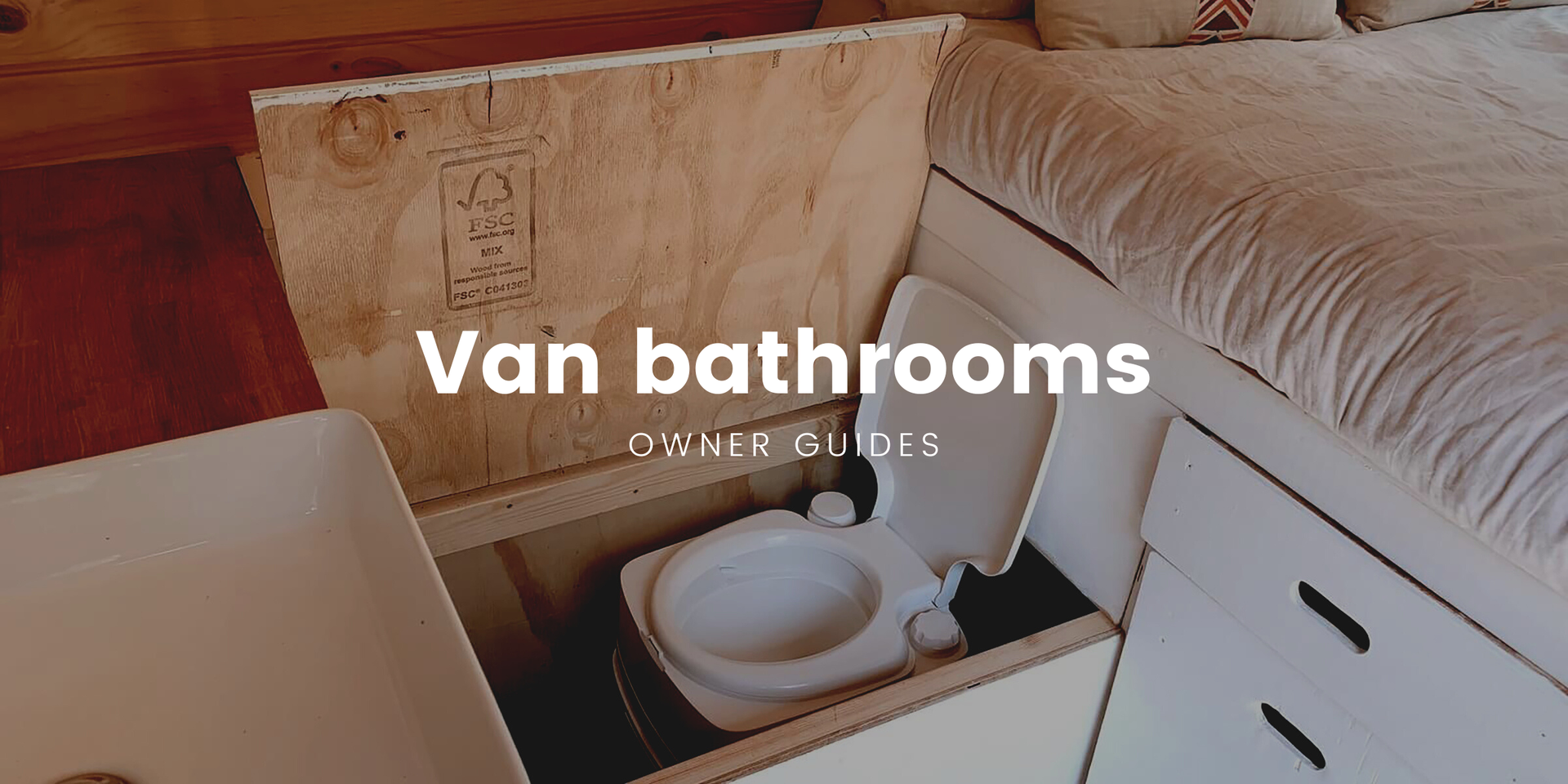 Campervan setup at a bush camp, complete with toilet and shower tent.