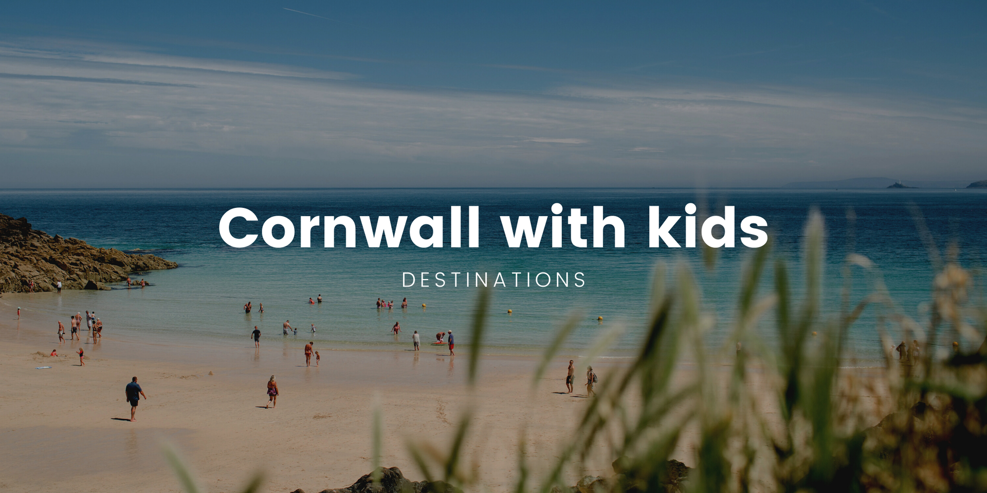 Family camping near the Cornish coast in a colourful tent. Sunshine, sea views and happy campers.