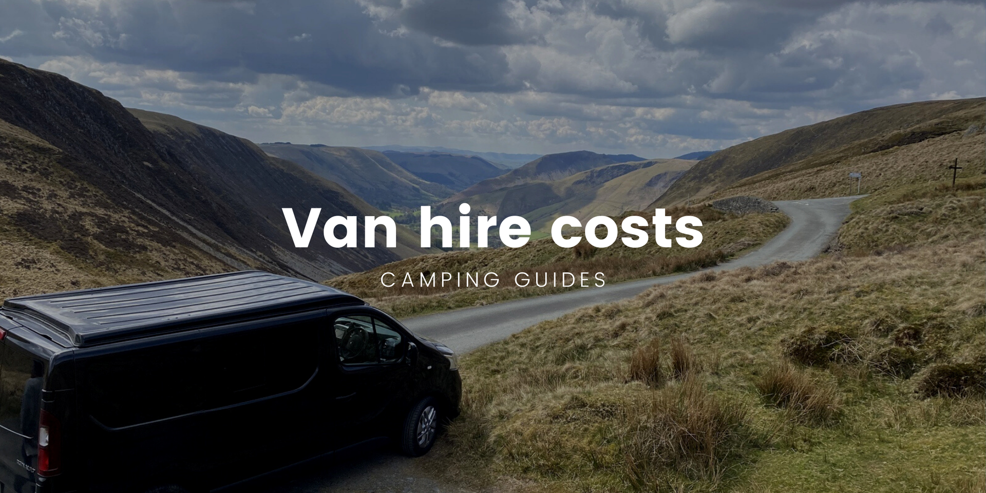 Campervan parked up at a scenic camping spot, ready for a road trip.