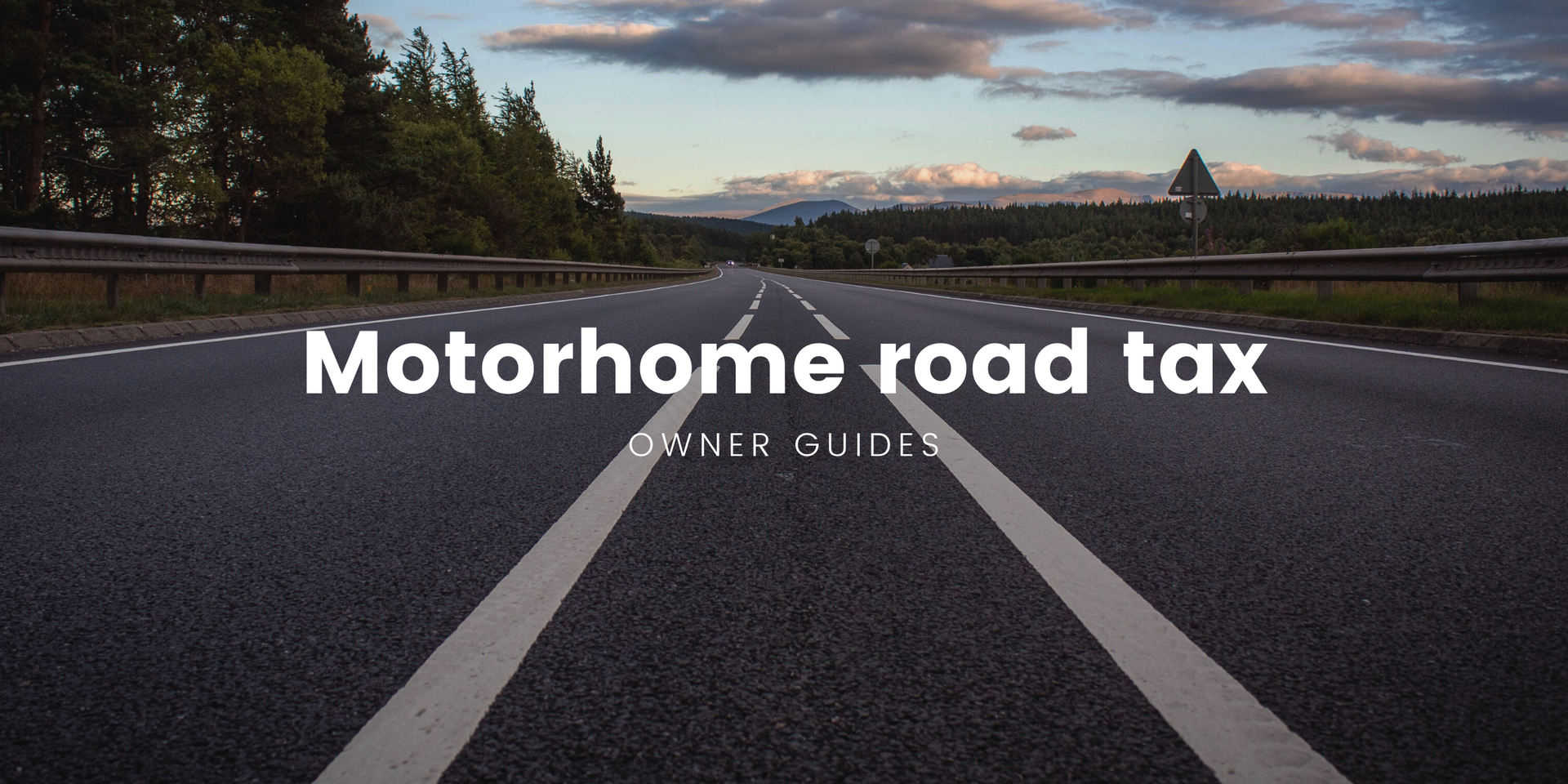 Motorhome parked on a coastal road, representing road trips and motorhome travel in the UK.