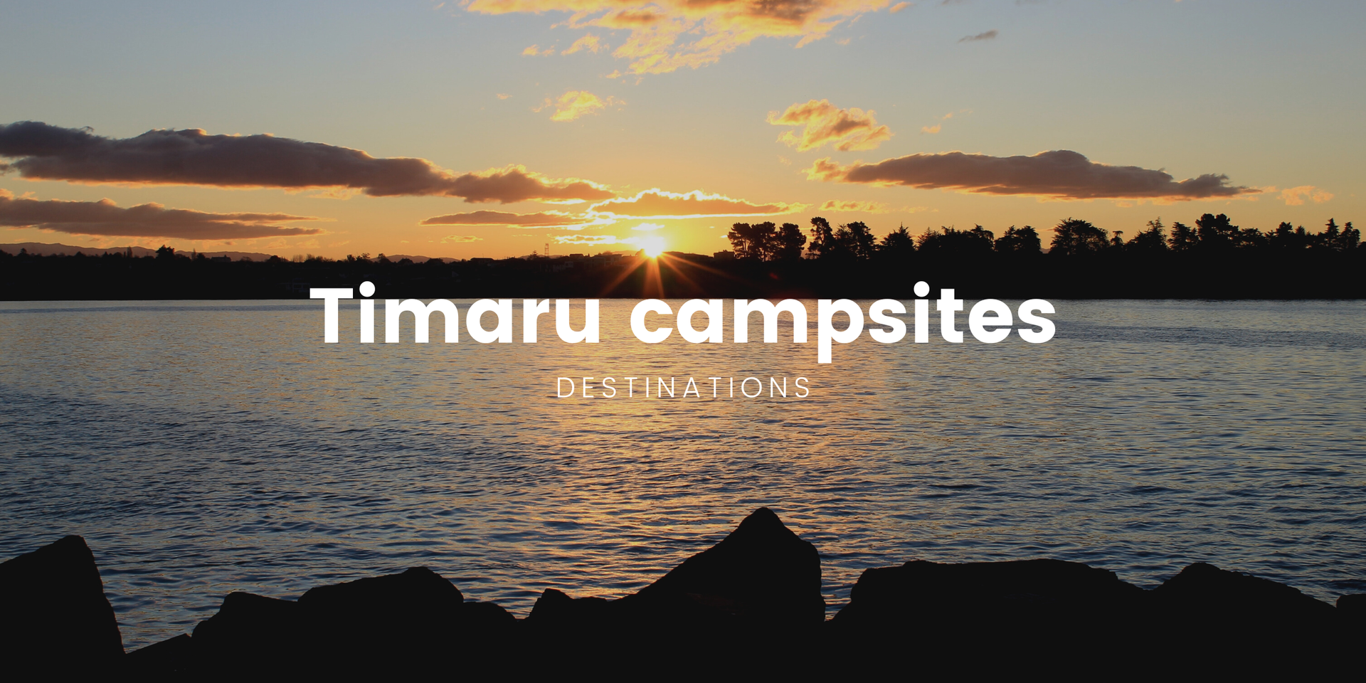Tent pitched at a scenic Timaru camping ground, with coastal views out to the Canterbury Bight.