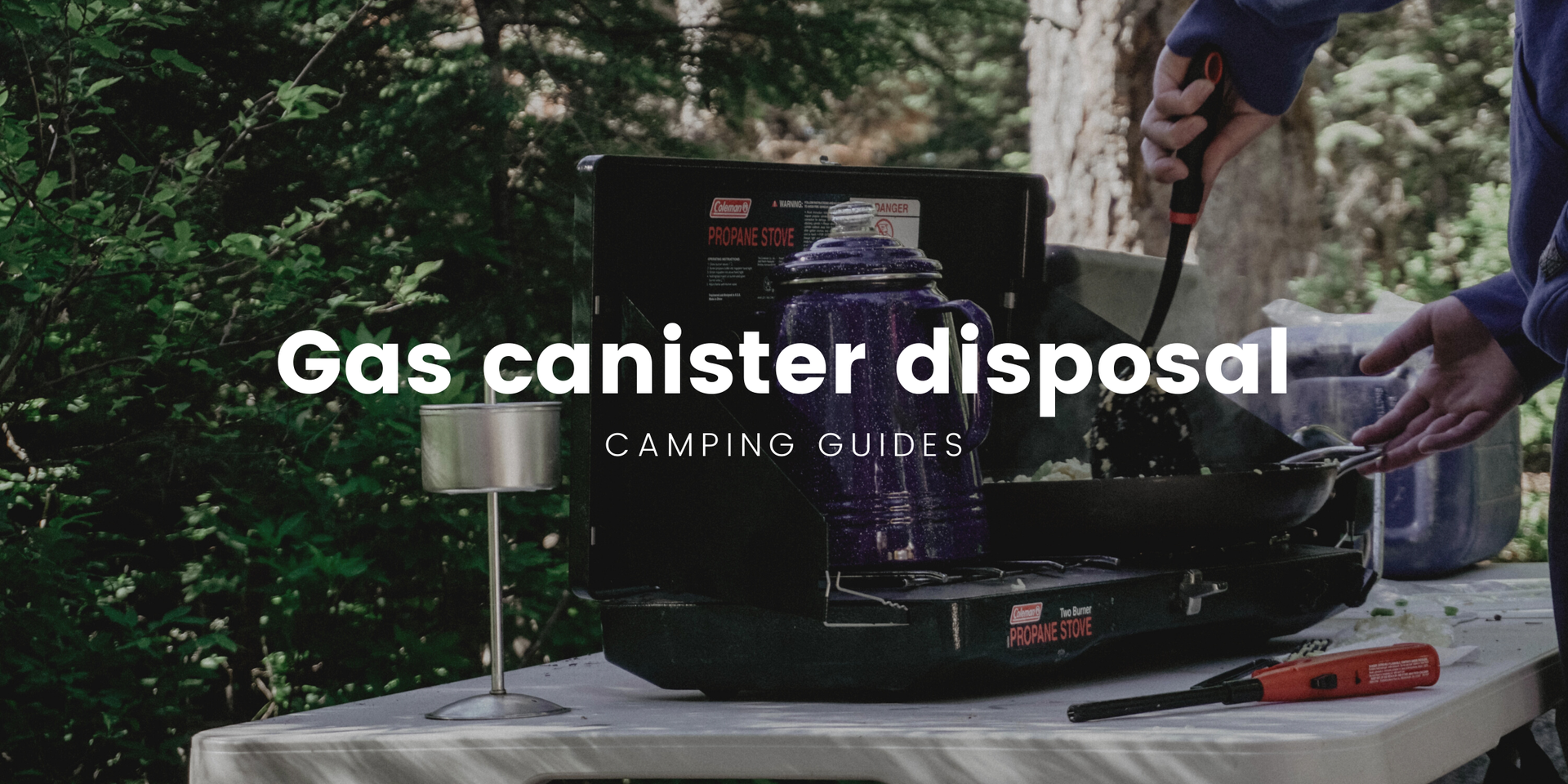 Tramper cooking brekkie on a gas cooker in the NZ bush. Empty gas canister beside her.