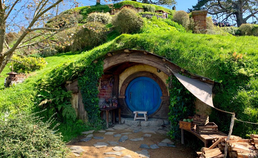 Campervan parked up with stunning North Island coastal view. Your ultimate Kiwi roadie starts here!